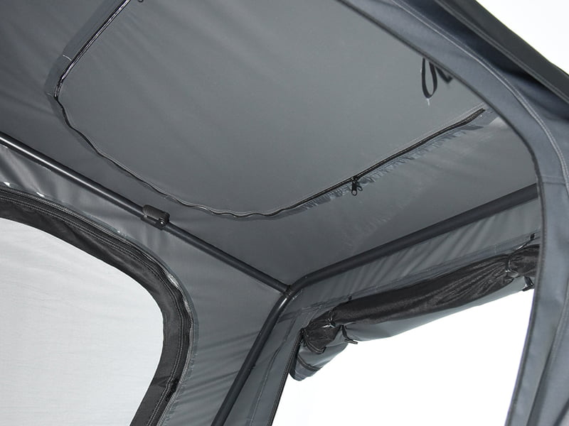 Campingtält på taket med stege Campingtält på taket med stege